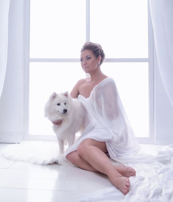 Woman in a calm state with her eyes closed, focusing on relaxation.